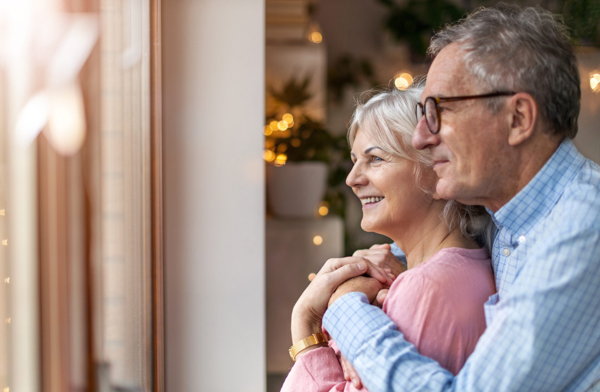 Couple looking at window 1