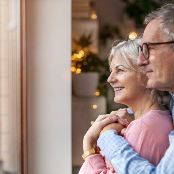 Couple looking at window 1