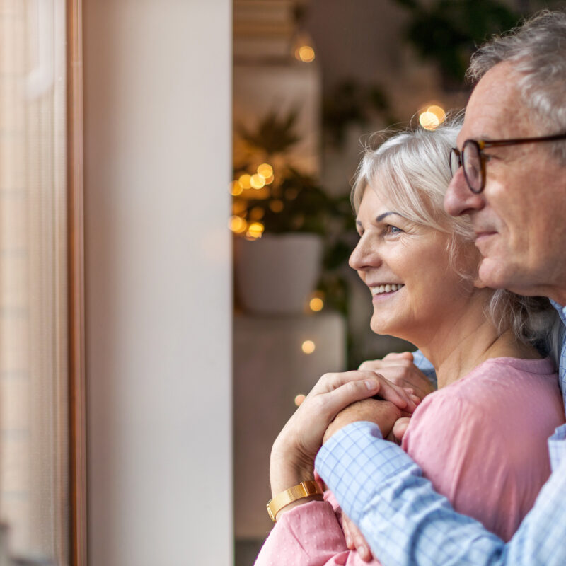 Couple looking at window 1